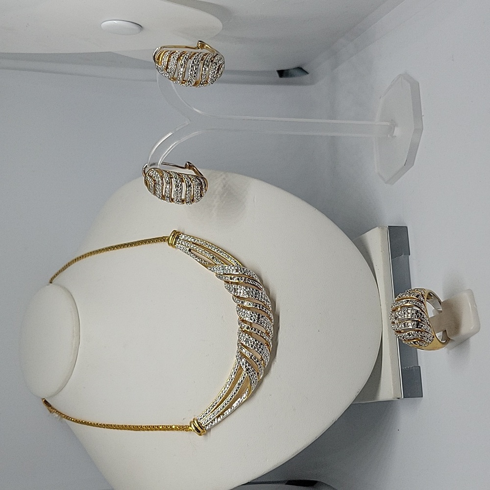 Goldtone necklace, earrings, and ring set with diamond chips
